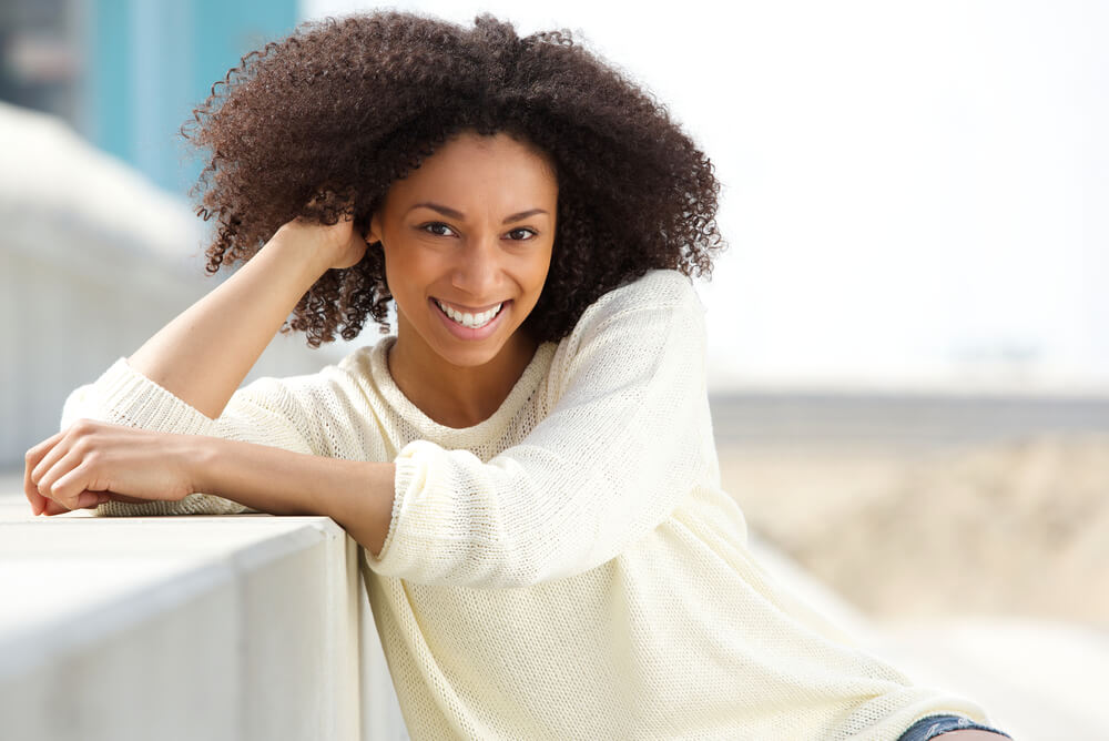Close Up Portrait Of A Smiling African American Woman stock image
